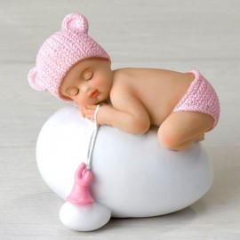 Figura de bebê dormindo no ovo